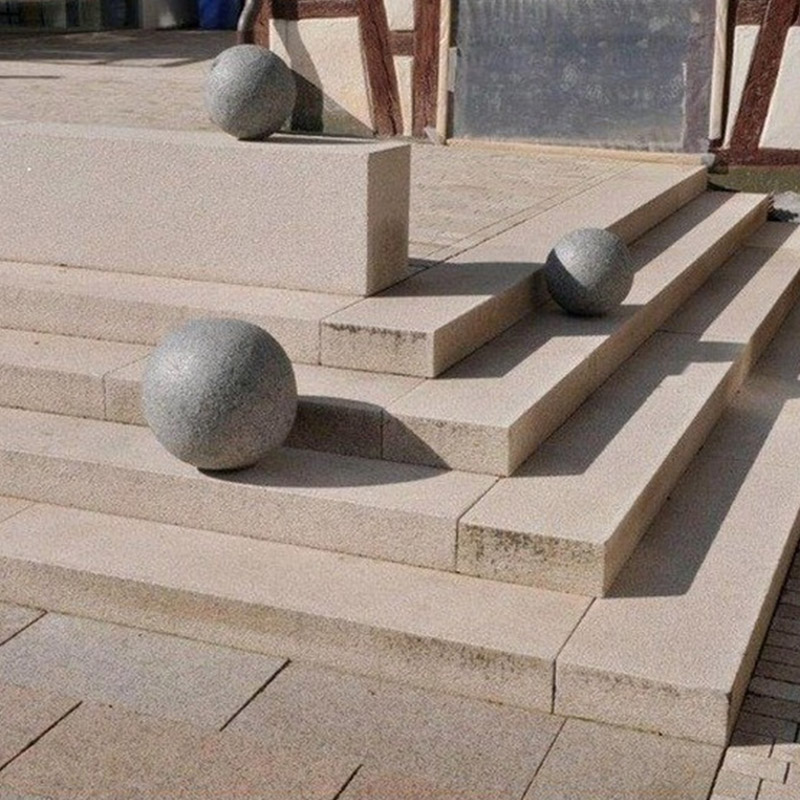 Peldaños de escaleras de granito amarillo