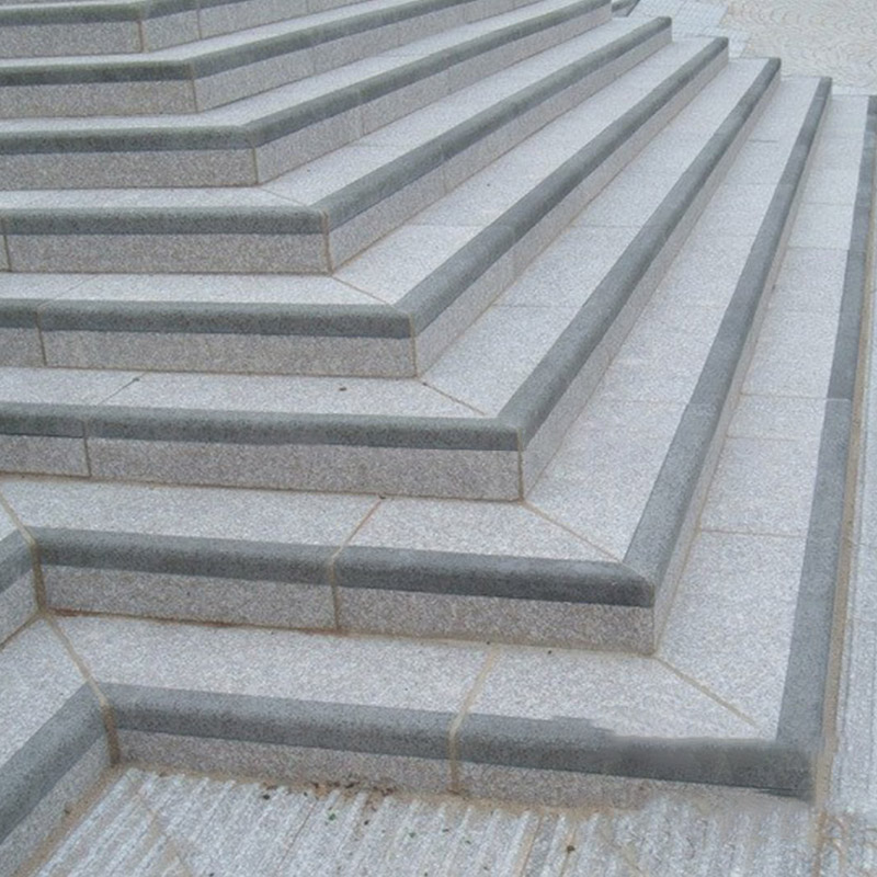 Diseño de escaleras de granito blanco sésamo.